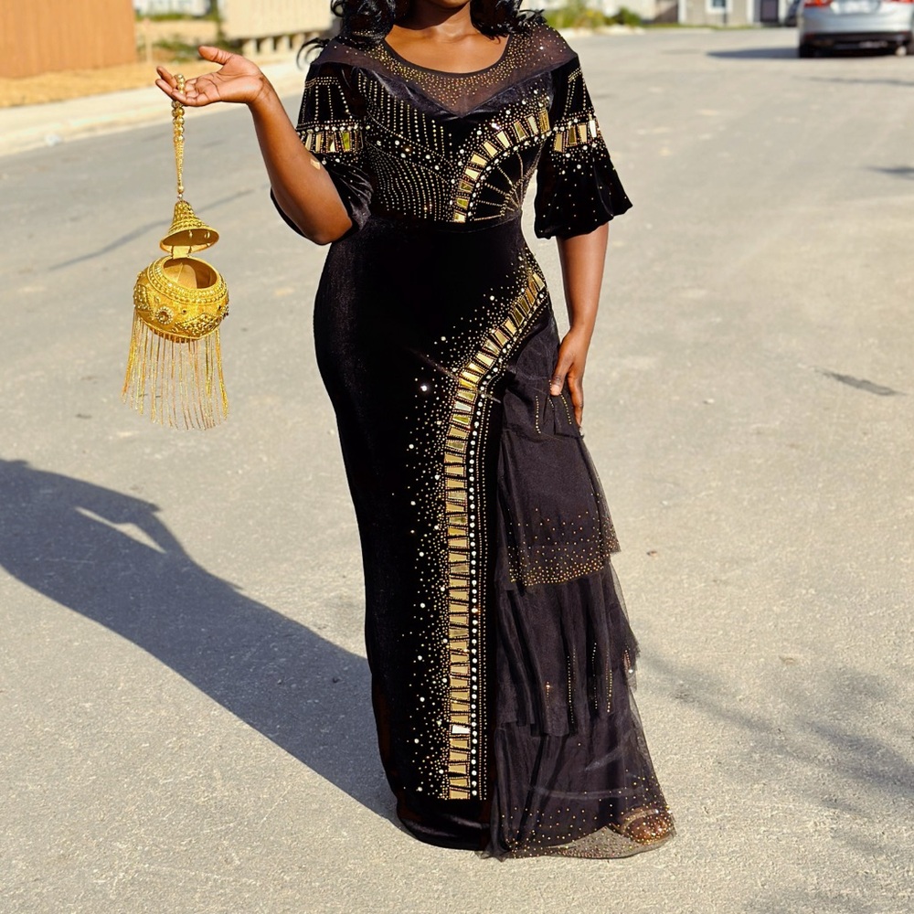 Beautiful maxi black Gold stoned velvet Dress.